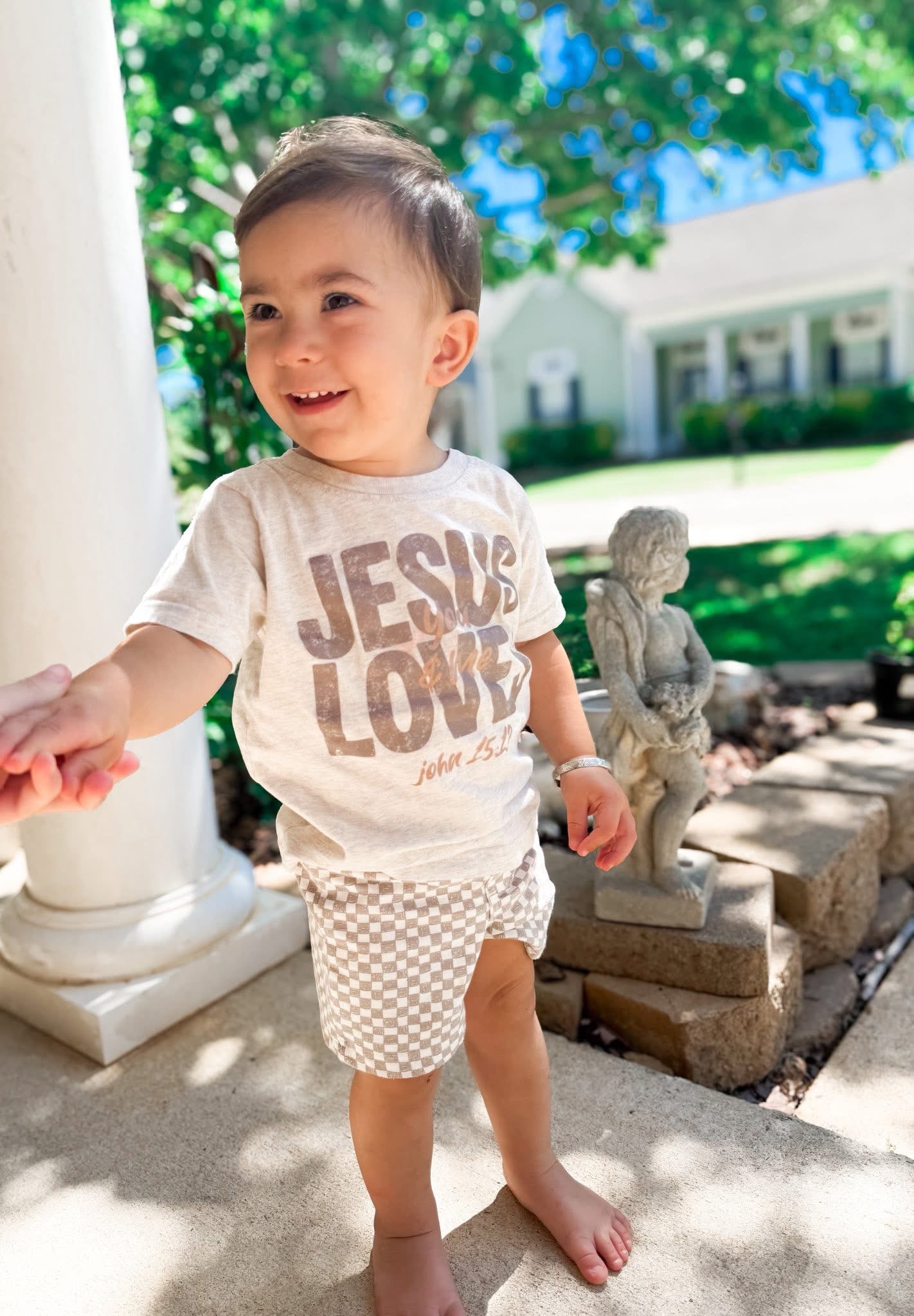 Jesus loves you and me kids tee